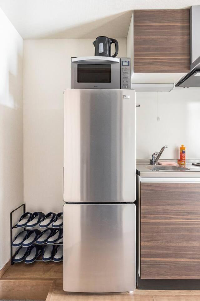 Apartment 上野駅徒歩５分シングルベッド４台+ソファベッド２台 1ldk Präfektur Tokio