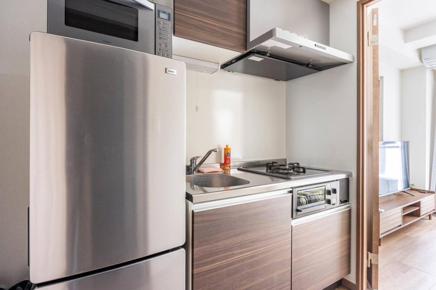 上野駅徒歩５分シングルベッド４台+ソファベッド２台 1ldk Appartement *