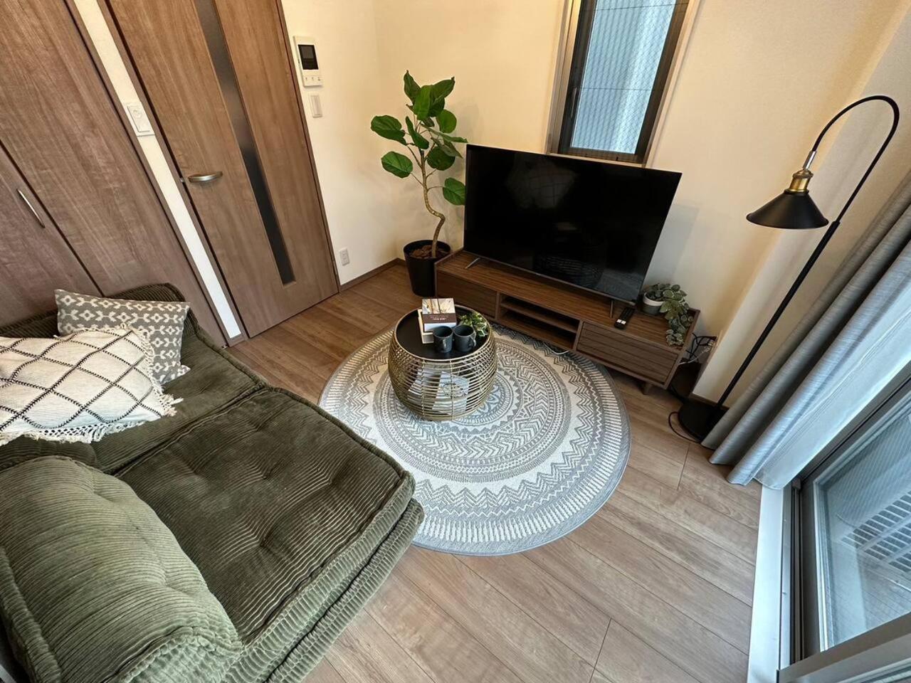 Appartement 上野駅徒歩５分シングルベッド４台+ソファベッド２台 1ldk *